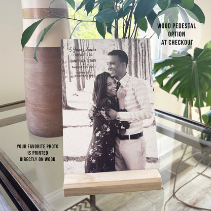 Custom wood photo print sitting on a tabletop wooden pedestal, a perfect 5 year wedding anniversary keepsake