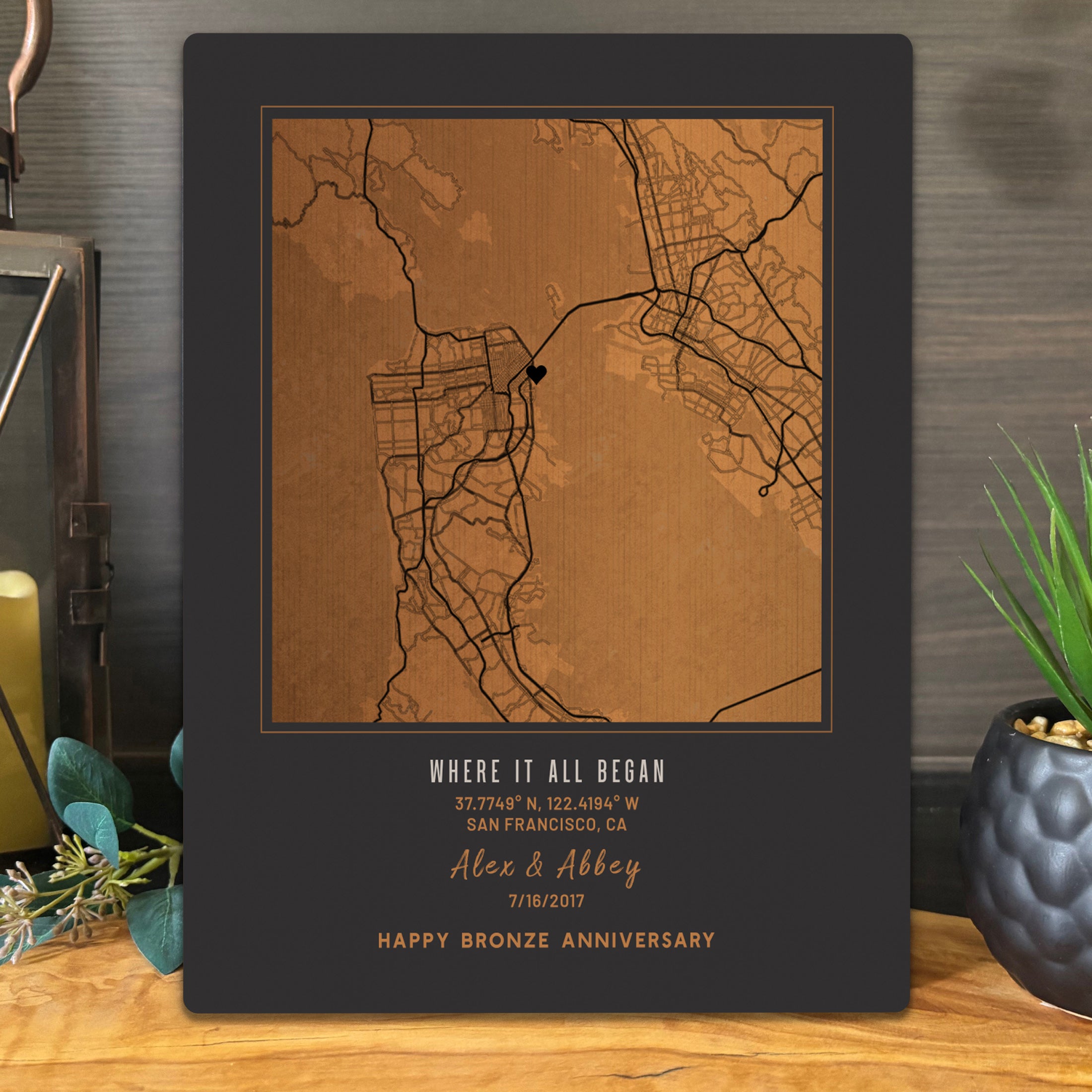 8th Anniversary Bronze Personalized map print with coordinates and names on a metal surface