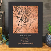 A personalized copper map anniversary print displayed on a metal surface. The black plaque features a copper-toned map of Stafford, Virginia, with the text &