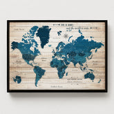 World map poster with wooden texture and blue oceans on a white wall. Roadtrips of USA
